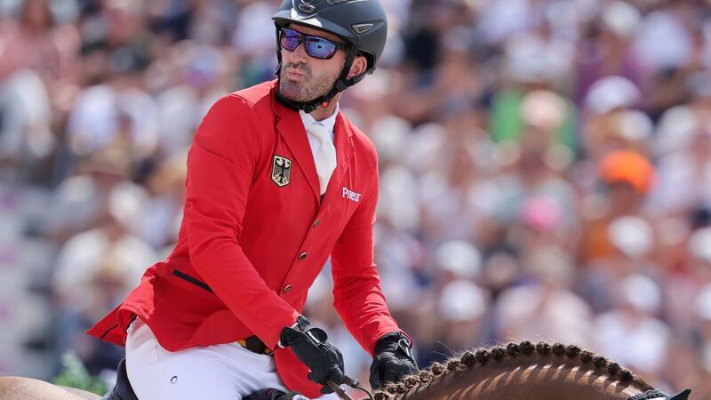 Enttäuschung bei den Springreitern: Platz fünf statt Gold Philipp Weishaupt und die deutschen Reiter sind enttäuscht