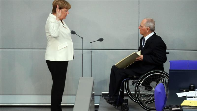 2018 - Bundeskanzlerin Angela Merkel und Bundestagspräsident Wolfgang Schäuble bei der Vereidigung. 
