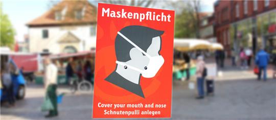 An vielen Orten besteht weiterhin Maskenpflicht. Archivfoto: Frank/Maskenbild: dpa