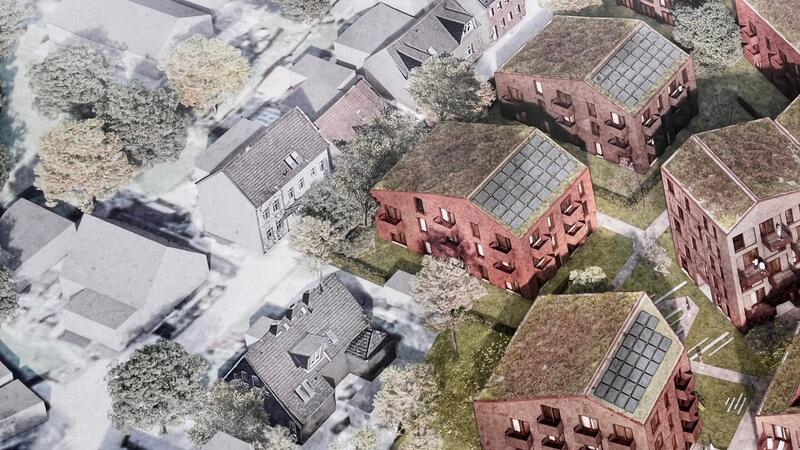Gummi-Schmidt-Gelände: Nachbarn sorgen sich um Neubaupläne von Lindemann Auf dem Bauzaun-Banner zeigt eine Visualisierung, wie die derzeit freie Fläche zur Kerstensstraße hin bebaut werden soll.