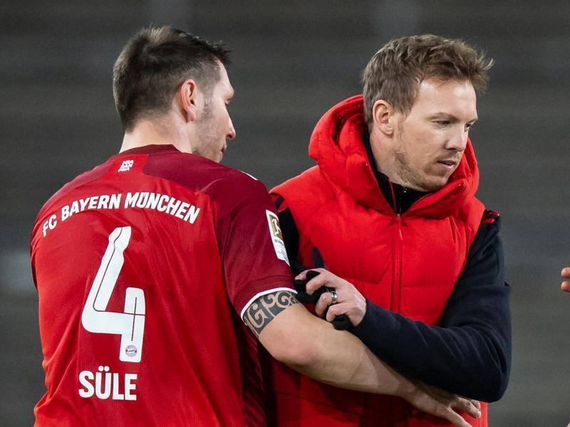 Bayerns Trainer Julian Nagelsmann (r) und Niklas Süle. Foto: Tom Weller/dpa