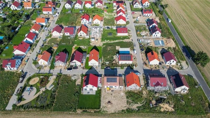 Druck am Wohnungsmarkt - Was 2025 Mietern und Käufern bringt Bei den Kaufpreisen für Immobilien sehen Experten nur leichte Zuwächse in den meisten Regionen (Archivbild).