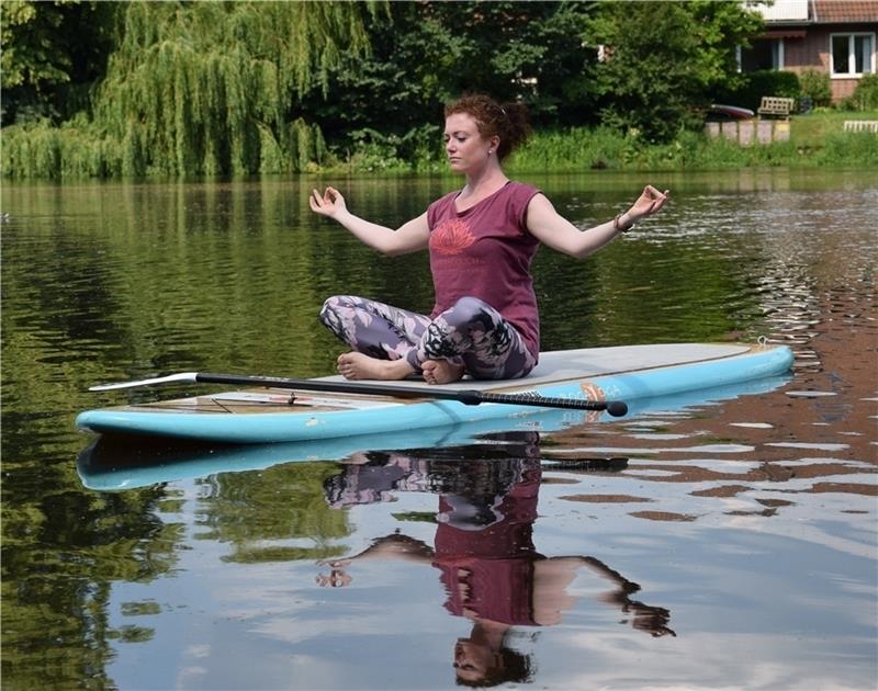 SUP-Yoga: Ein innerer und äußerer Balanceakt auf dem Wasser