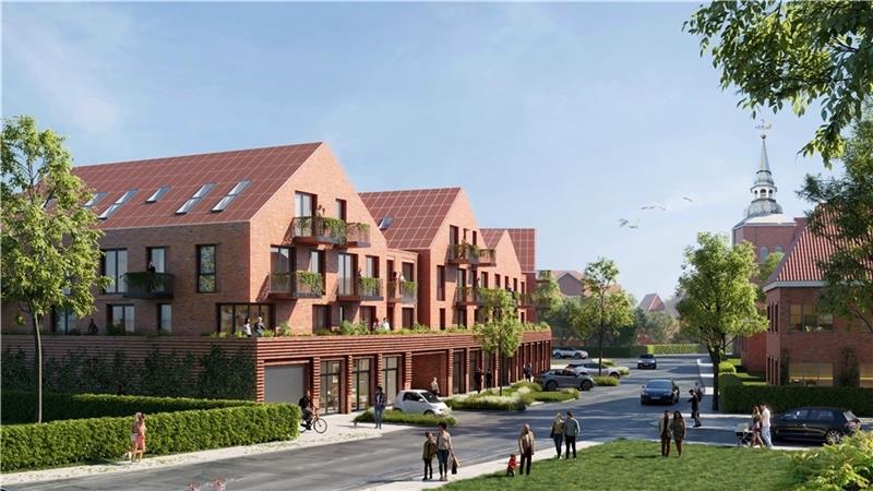 Blick in die Zukunft: So soll der Neubau auf dem Gelände des alten Feuerwehrgerätehauses an der Bleiche in Horneburg in drei Jahren aussehen. Rechts ist die Liebfrauenkirche zu sehen. Visualisierung: sop architekten (slapa oberholz pszczuln