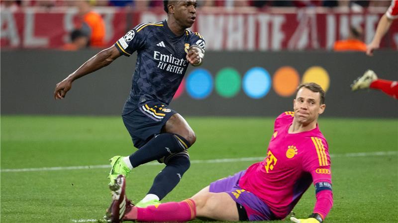 Brisantes Wiedersehen: Real-Star Vinícius Júnior und Bayern-Torwart Manuel Neuer. (Archivbild)