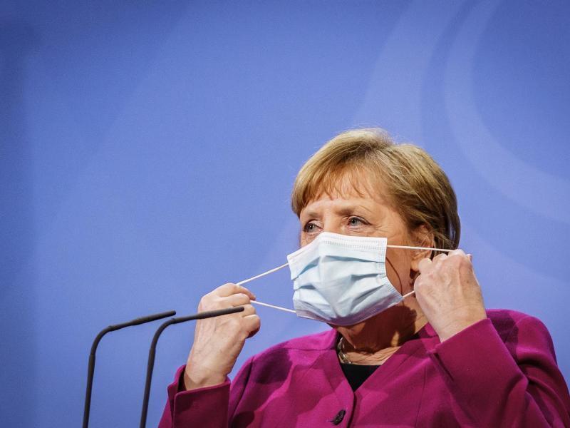 Bundeskanzlerin Angela Merkel (CDU) mit Maske. Foto: Michael Kappeler/dpa-pool/dpa/Archivbild
