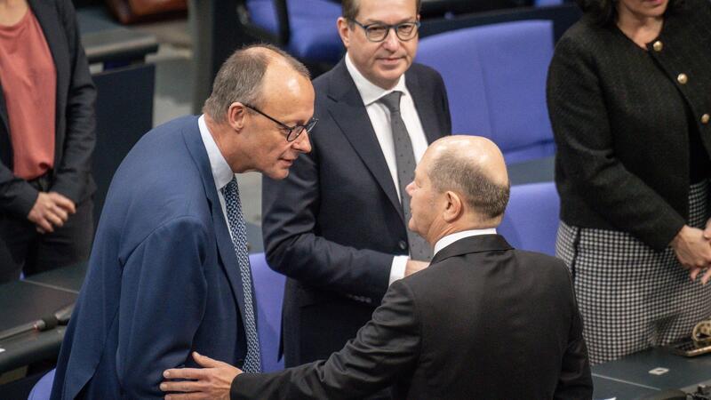 CDU-Chef Friedrich Merz (l) hat sich in einem Brief an Bundeskanzler Olaf Scholz gewendet.