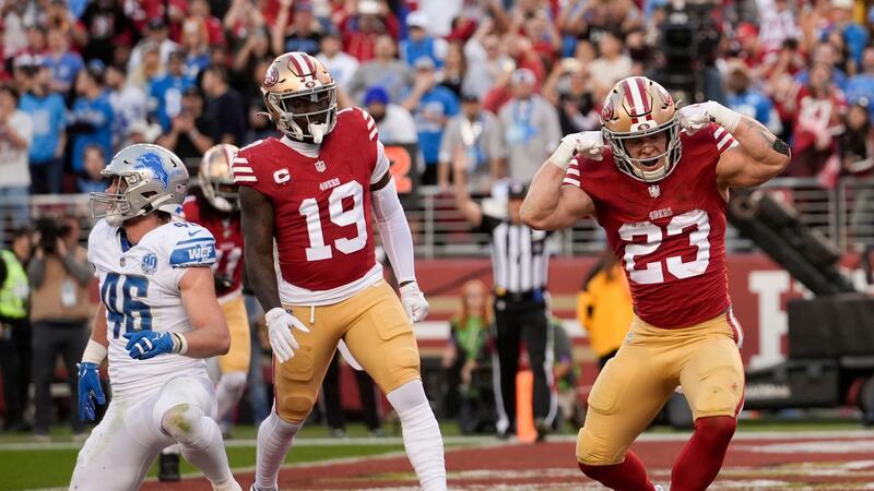 Christian McCaffrey, Running Back der San Francisco 49ers, lässt seine Muskeln spielen. Nach einem Sieg gegen die Detroit Lions stehen die 49ers um Super Bowl.