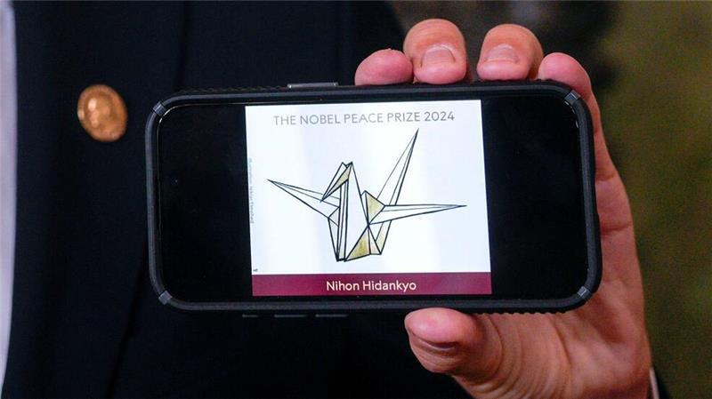 Das Logo der japanischen Organisation Nihon Hidankyo zeigt eine stilisierte Friedenstaube.