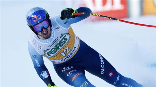 Der Italiener Dominik Paris jubelt im Ziel.