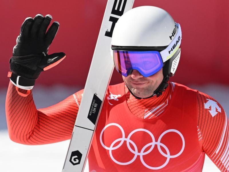 Der Schweizer Beat Feuz jubelt im Ziel. Foto: Robert Michael/dpa-Zentralbild/dpa