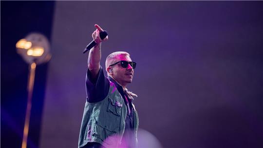 Der US-Rapper Macklemore ist umstrittener Headliner des Deichbrand-Festivals 2025.