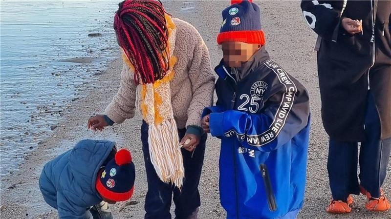 Der erste Ausflug: Uwe Kudlick fotografiert seine Frau Linda und seine drei Kinder am Strand der Nordseeküste.