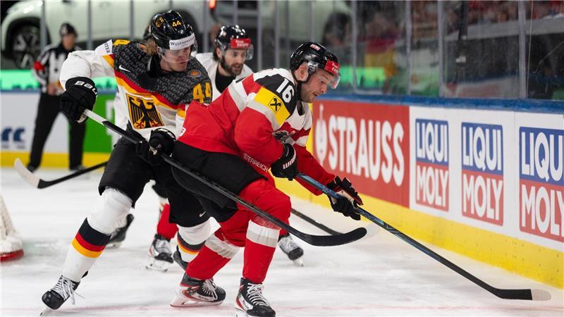 Trotz DEB-Sieg gegen Österreich: Viertelfinal-Chancen sinken Deutschland und Österreich lieferten sich ein physisches Spiel bei der Eishockey-WM.