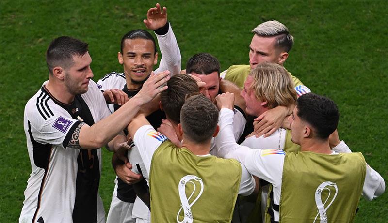 Deutschlands Niclas Füllkrug jubelt nach dem Tor zum 1-1. Foto: Robert Michael/dpa