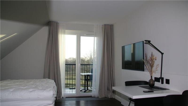 Die 51 Hotelappartements im "Überwasser" - wahlweise mit einem, zwei oder drei Zimmern - sind in drei stilvollen Farbvarianten gestaltet und bieten Komfort auf gehobenem Niveau.