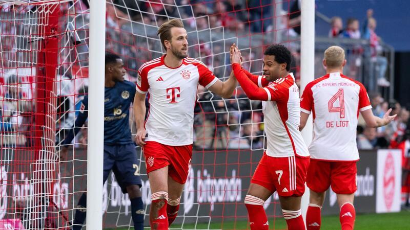 Die Bayern um Torjäger Harry Kane (l) überzeugten gegen Mainz.