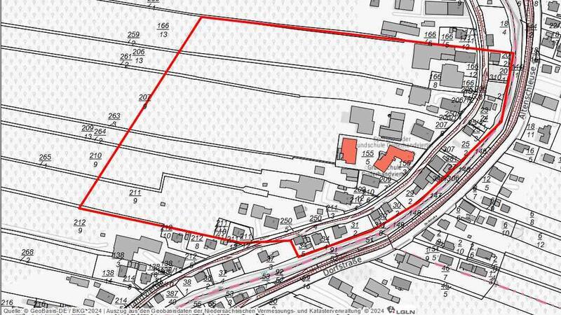 Spektakuläre Pläne für die Ganztagsschule in Guderhandviertel Die Gemeinde Guderhandviertel hat sich über eine Satzung in diesem Bereich (rot umrandet) ein Vorkaufsrecht gesichert.