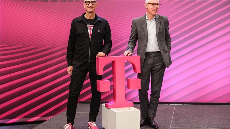 Die Magenta-Manager Tim Höttges (links) und Christian Illek.