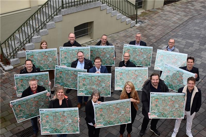 Die Sponsoren präsentieren mit dem Bürgermeister Knut Willenbockel (2. von rechts hinten) das erste Wimmelbild der Samtgemeinde Horneburg (9,50 Euro). Foto: Vasel