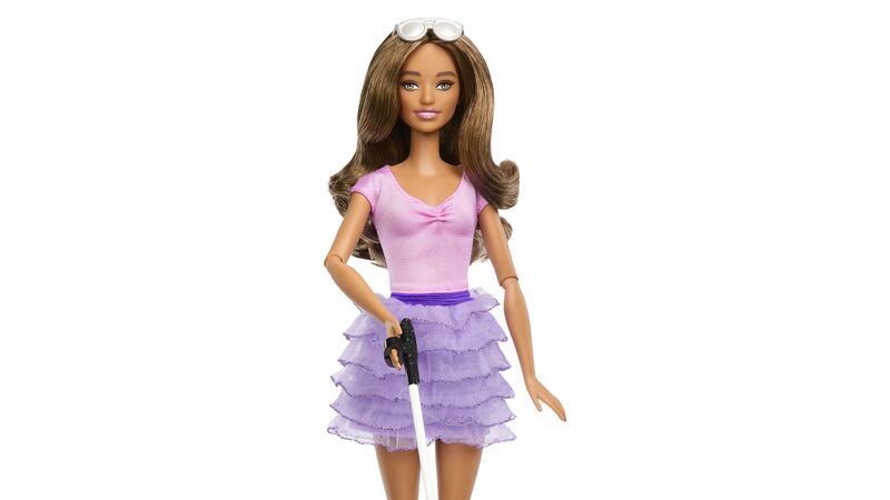 Erste blinde Barbie-Puppe Die neue Barbie-Puppe hat einen Stock und trägt eine Sonnenbrille.