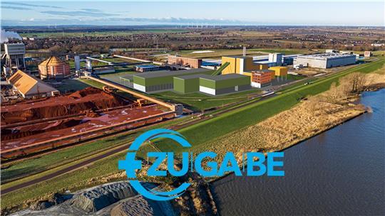 Direkt neben den Anlagen der AOS mit ihrer roten Erde soll das Holzkraftwerk an der Elbe entstehen.