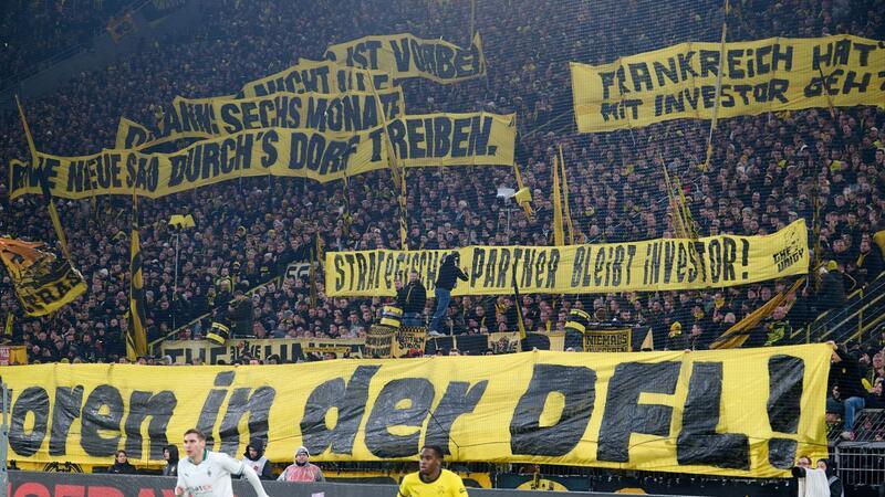 Milliarden-Verlockung: Dritter DFL-Anlauf mit Investoren Dortmunds Fans demonstrieren gegen Investoren in der DFL.