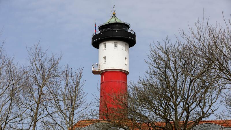 Leuchtturmwärter gesucht: Riesiger Bewerber-Ansturm Ein Blick auf den alten Leuchtturm in Wangerooge: Hier wollen viele Menschen arbeiten.