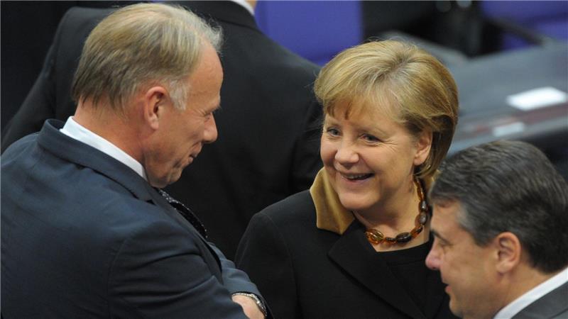 Ein Foto aus alten Zeiten: Angela Merkel 2012 mit Jürgen Trittin. Foto: Sören Stache/dpa