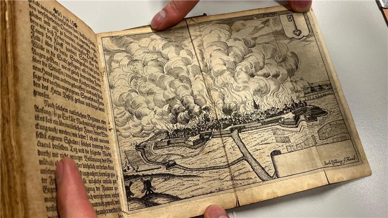 Großalarm für Stader Feuerwehr: BBS in Flammen - Schwerer Unfall Ein Kupferstich aus einem Buch im Staatsarchiv zeigt den Stader Stadtbrand von 1659.