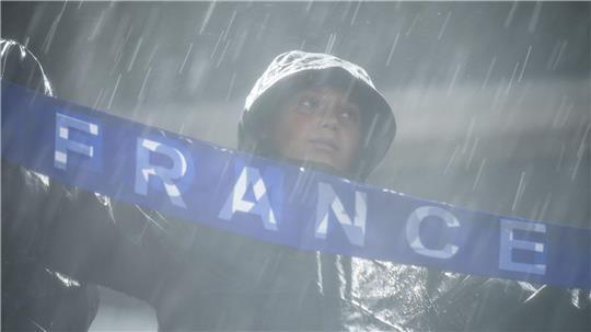 Ein französischer Fan im Regen von Philadelphia.