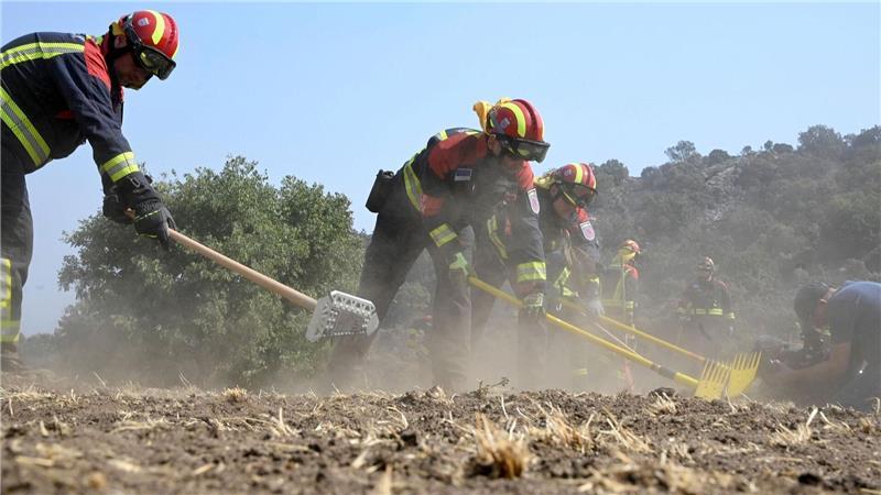 Bilder des Tages Feuerwehrleute aus Deutschland helfen bei der Bekämpfung der Waldbrände in Spanien.