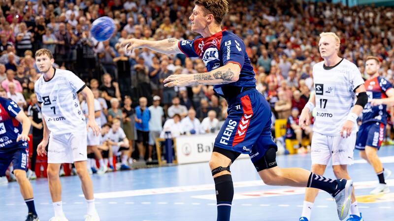 Flensburgs Handballer bezwingen Eisenach 35:28 Flensburg-Handewitts Emil Jakobsen erzielt einen Treffer. Der Bundesligist hat auch sein sechstes Heimspiel gewonnen.