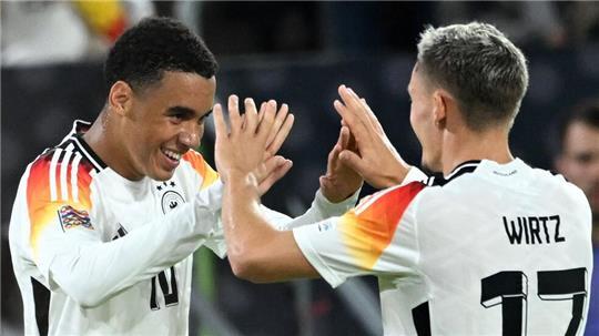 Im Nationalteam Mitspieler, in der Liga Gegner: Jamal Musiala (l) und Florian Wirtz