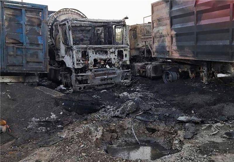 Nato-Admiral: Russland verliert jeden Tag Boden In Odessa bleiben nach russischen Drohnenangriffen verbrannte Lastwagen auf der Straße zurück.
