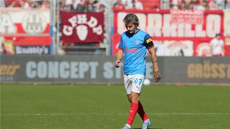 Bochum und Kiel steigen aus der Bundesliga ab - Das geht am Sonntag John Tolkin muss mit Holstein Kiel nach einer Saison wieder in die 2. Liga.