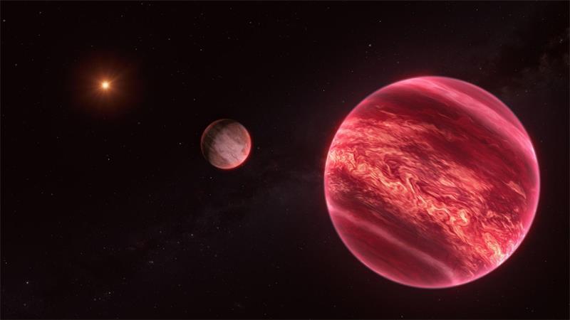 Künstlerische Darstellung des Systems um den Stern CD-35 2722. Das System besteht aus einem Stern, einem Braunen Zwerg und einem Satelliten.