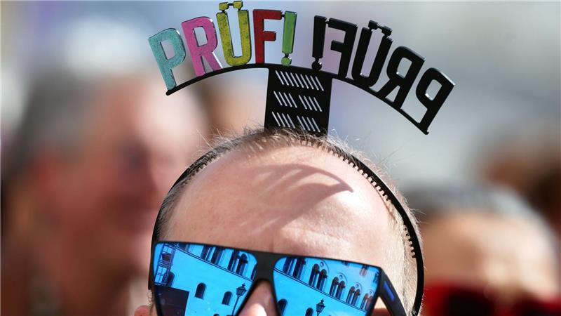 Kundgebung zur „Prüf-Kampagne“ in München
