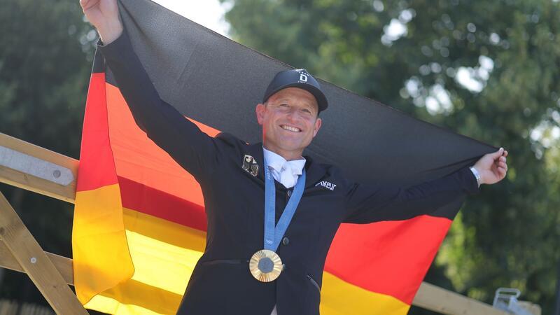 MIchael Jung feiert sein viertes Olympia-Gold.