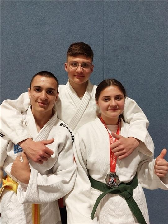 Magomed Torshkoev , Kirill Schlej und Nicole Schlej (v.l.)