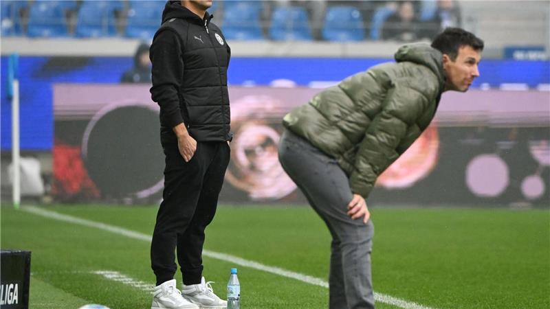 Marcel Rapp (l) muss mit Kiel die nächste Niederlage hinnehmen, Christian Eichner (r) darf aufatmen.