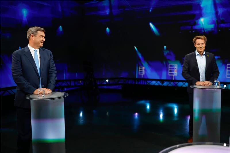 Söder und Hartmann streiten über schwarz-grüne Koalition Markus Söder (CSU, l) und Ludwig Hartmann (Bündnis 90/Die Grünen) dürften auf die Wahlergebnisse am Wochenende gespannt sein.