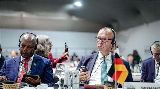 Merz macht einen Kurzbesuch bei der Klimakonferenz.