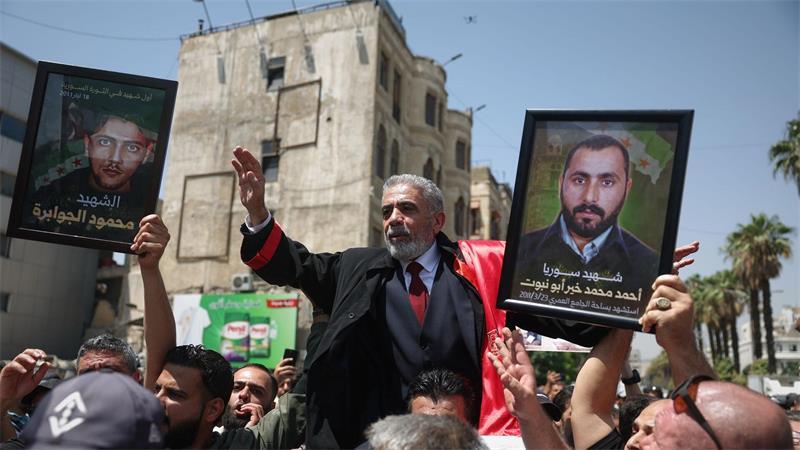 Syrien: Baschar al-Assad zu Tode verurteilt Nach dem Urteil gegen Nadschib kam es zu Jubel und Freudenschreien.