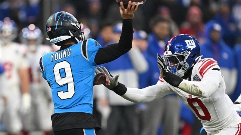 NFL-Spektakel in München: Panthers gewinnen Football-Krimi Panthers-Quarterback Bryce Young mit einem Passversuch.