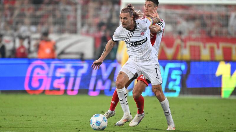 Wieder torlos: St. Pauli hadert mit der Präzision Pauli-Kapitän Jackson Irvine setzt sich gegen Unions Janik Haberer durch