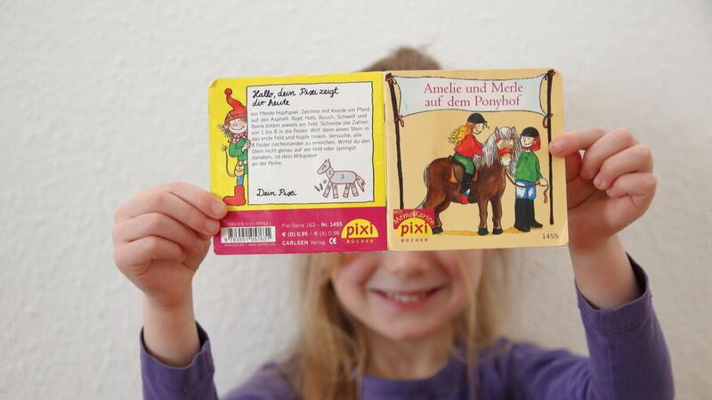 Faszination Pixi: Warum diese Familie fast 900 Bücher besitzt Pixi macht den Kindern einfach gute Laune. Foto: Koppe