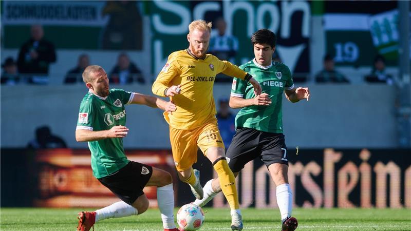 Traumtor reicht nicht: Dresden auch in Münster ohne Sieg Preußen Münster (grün) und Dynamo Dresden (gelb) lieferten sich einen offenen Schlagabtausch.