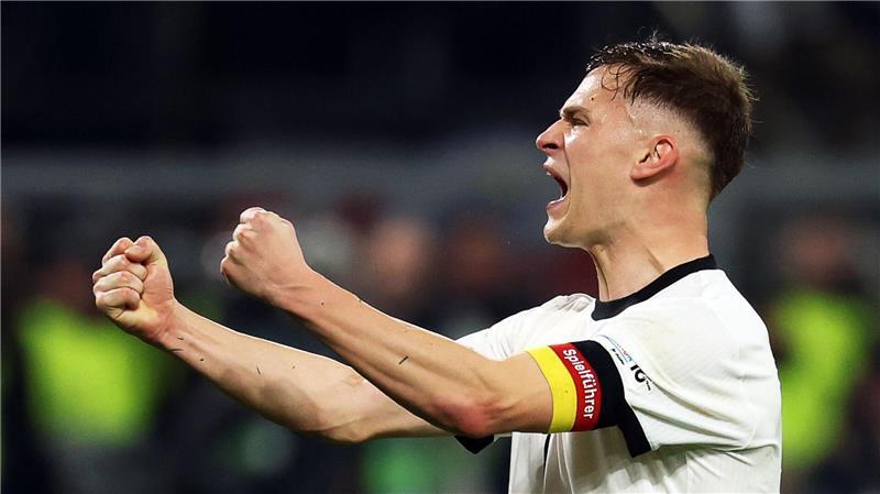 Der große Anführer Kimmich und ein Balljunge „auf Zack“ Pure Freude: Joshua Kimmich jubelt über den Einzug ins Final-Four-Turnier.