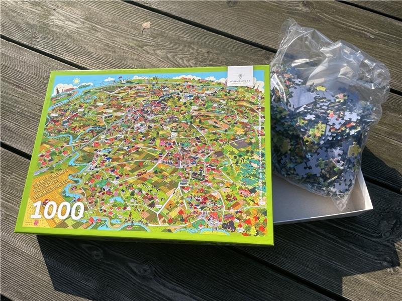 Wimmelbild: Samtgemeinde Oldendorf-Himmelpforten gibt es jetzt auch als Puzzle Puzzle mit 1000 Teilen.
